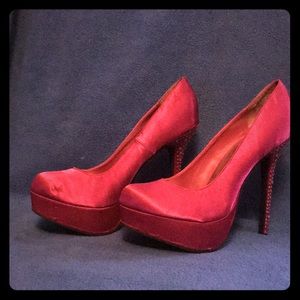 Hot pink satin heels with jeweled heels